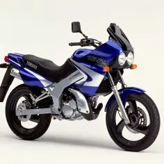 Niebieski motocykl Yamaha TDR z owiewką i podwójnymi światłami.