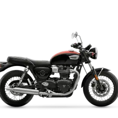 Czarny motocykl Triumph Speedmaster z czerwonym pasem na baku, klasyczny styl, gotowy na przygodę.