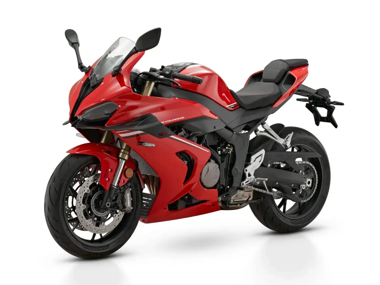 Czerwony sportowy motocykl, jeden z wielu ekscytujących modeli w świecie motoryzacji.
